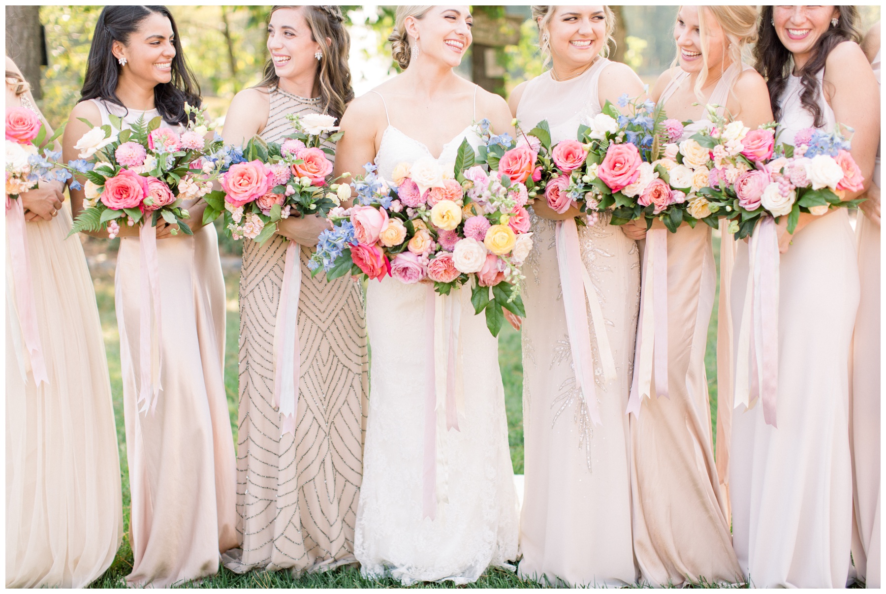 bridesmaids with floral bouquets 