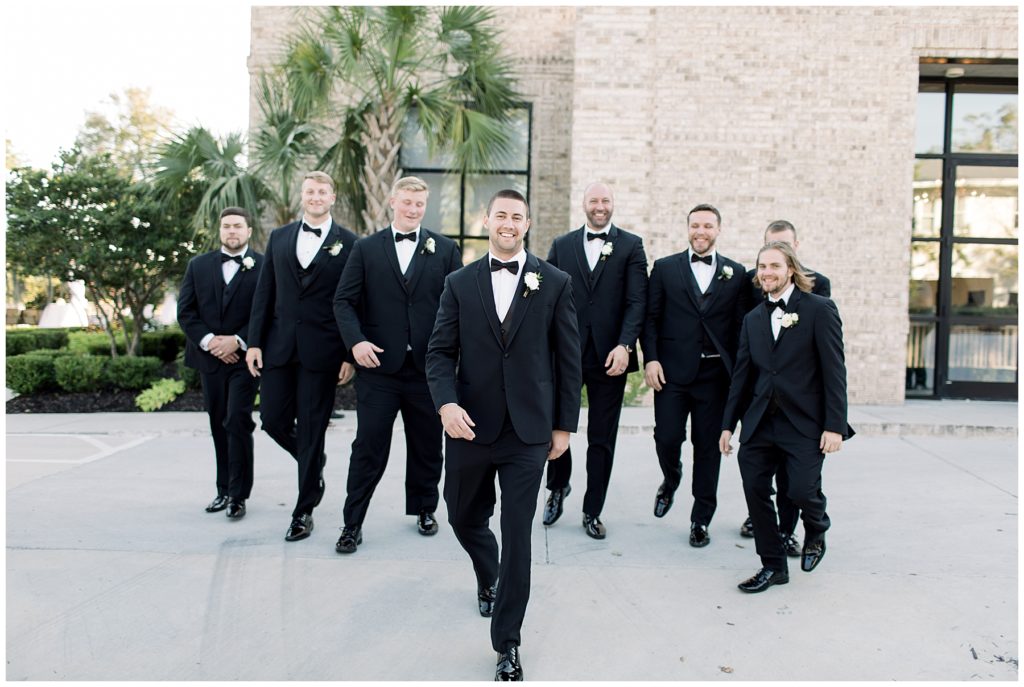 groomsmen walking together