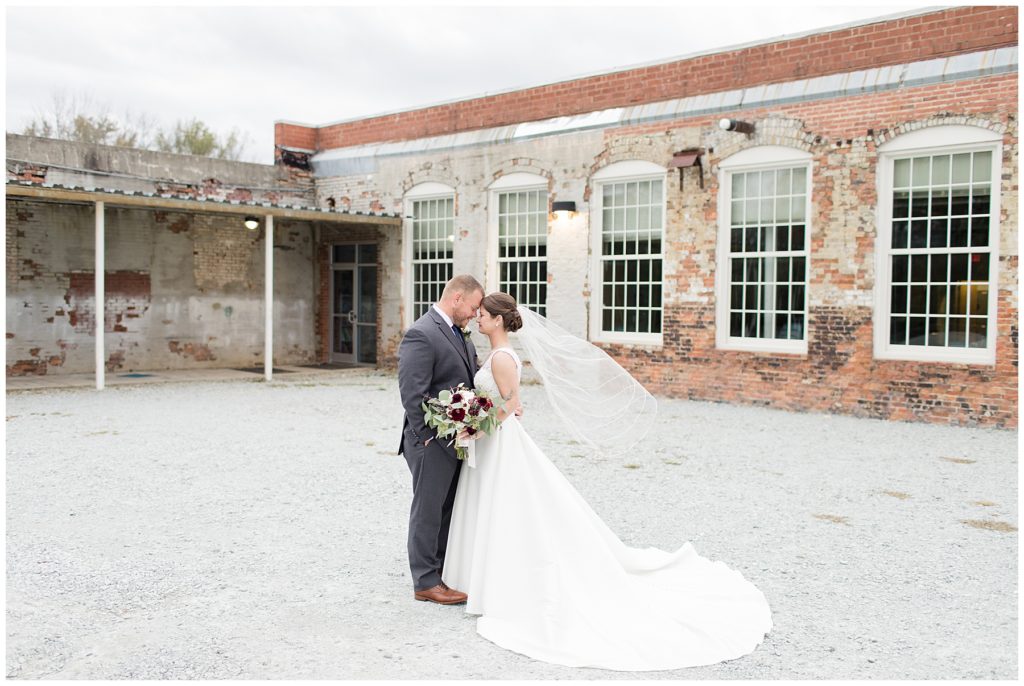 bride and groom at the cloth mill
