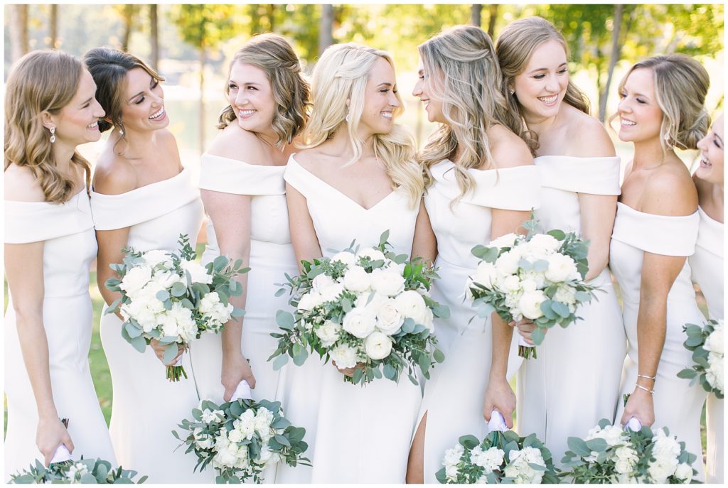 bridesmaids laughing together 